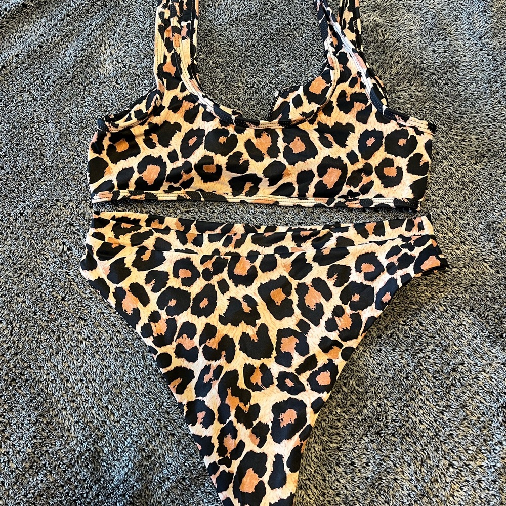 Ladies 2 piece cheetah print swimsuit. Size medium. #P79
